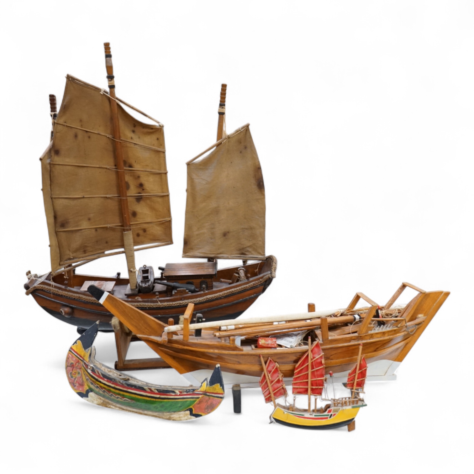 A model of a Chinese junk, a model ship and two other models of boats, largest 71cm in length